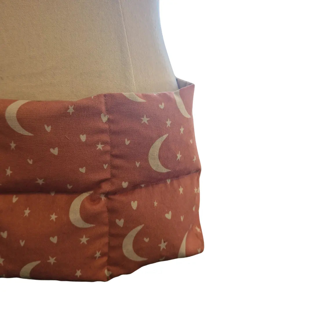 Handmade lupin seed heat and cold wrap showing Moon and Stars cotton fabric