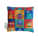 Handmade Kids Heat & Cold Pack featuring a happy monster print, filled with Australian-grown lupin seeds for natural relief from bumps, bruises and growing pains.