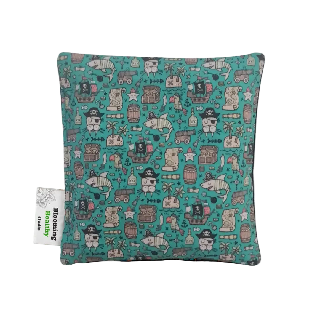 Handmade Kids Heat & Cold Pack featuring a pirate print, filled with Australian-grown lupin seeds for natural relief from bumps, bruises and growing pains.