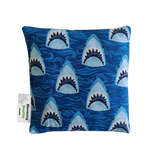 Handmade Kids Heat & Cold Pack featuring a shark print, filled with Australian-grown lupin seeds for natural relief from bumps, bruises and growing pains.