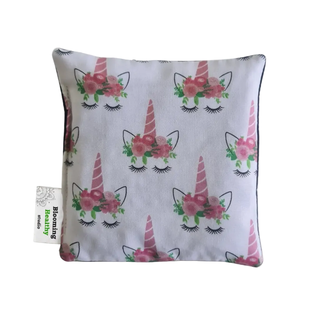 Handmade Kids Heat & Cold Pack featuring a unicorn print, filled with Australian-grown lupin seeds for natural relief from bumps, bruises and growing pains.