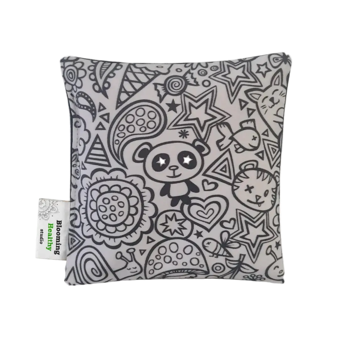 Handmade Kids Heat & Cold Pack featuring a dinosaur print, filled with Australian-grown lupin seeds for natural relief from bumps, bruises and growing pains.